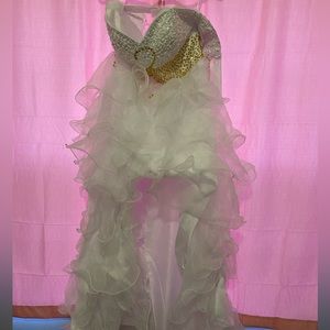 High-low wedding dress, brand new, never worn, no rips or tears.